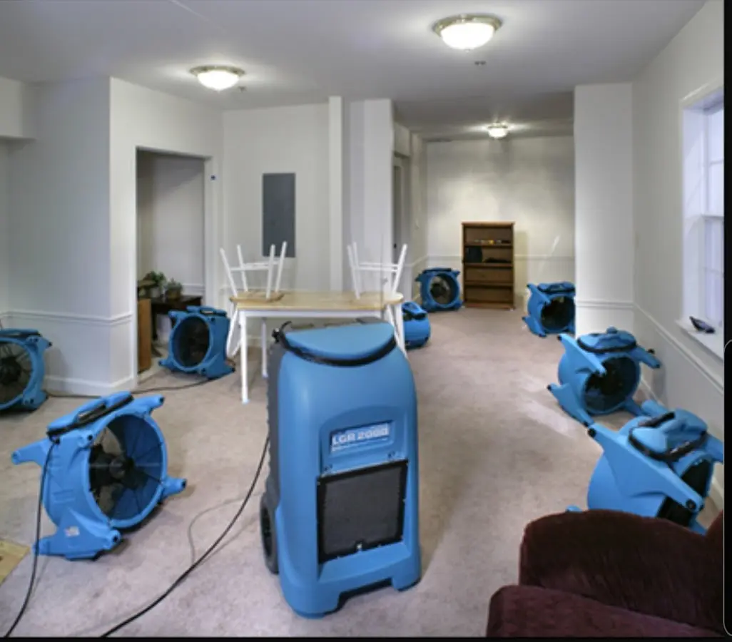 Air movers and dehumidifier setup for Water Extraction & Removal in West Plains